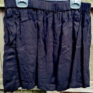 Black Cooperative pocket miniskirt